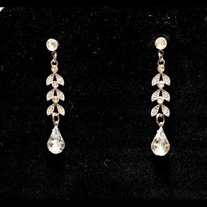 Gorgeous rhinestone dangle chandelier leaf earrings. Bridal, formal, prom